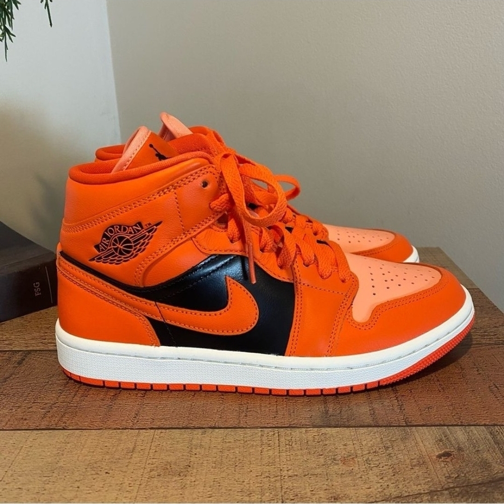 Air Jordan 1 Mid Orange and Black Sneakers